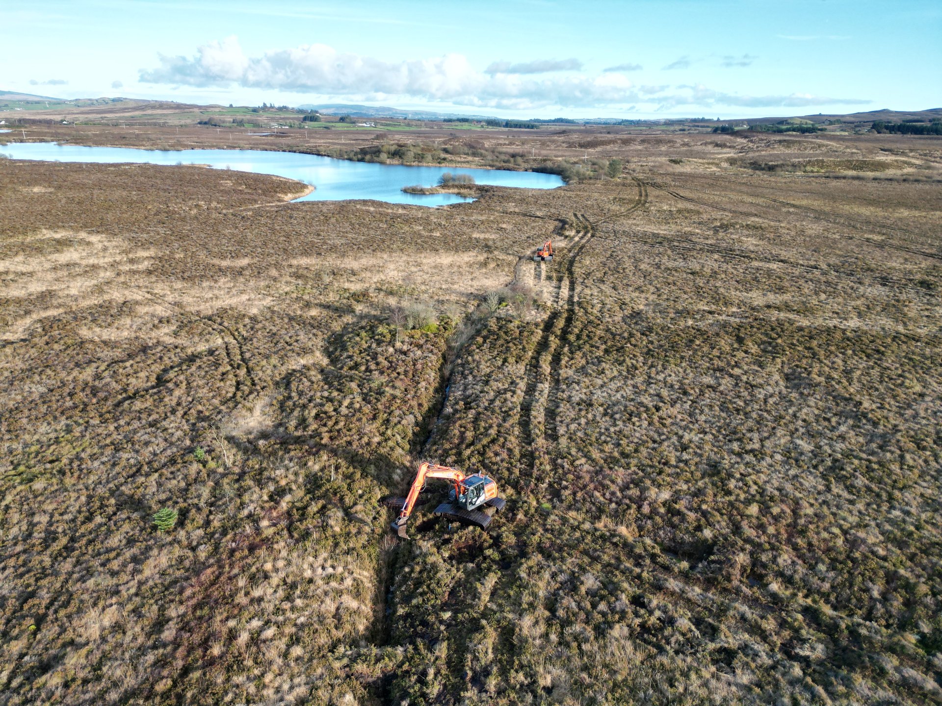 Aerial drone image of peatland restoration bunds and re-wetting dams at The Murrins